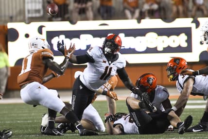 Oklahoma State Cowboys linebacker Amen Ogbongbemiga has COVID-19