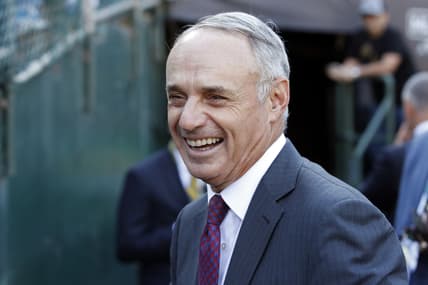 MLB commissioner Rob Manfred smiles