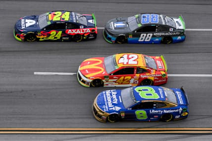 NASCAR driver Kyle Larson races against William Byron at Talladega Superspeedway