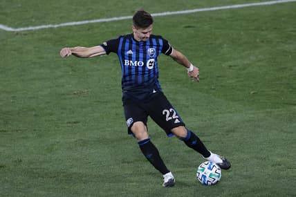 Oct 3, 2020; Harrison, New Jersey, USA; Montreal Impact defender Jukka Raitala (22) shoots the ball against the Chicago Fire during the second half at Red Bull Arena. Mandatory Credit: Vincent Carchietta-USA TODAY Sports