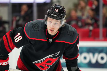 Dec 31, 2019; Raleigh, North Carolina, USA;  Carolina Hurricanes center Ryan Dzingel (18) at PNC Arena. The Carolina Hurricanes defeated the Montreal Canadiens 3-1. Mandatory Credit: James Guillory-USA TODAY Sports