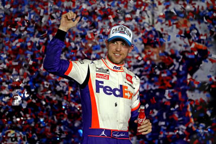 Feb 17, 2020; Daytona Beach, Florida, USA; NASCAR Cup Series driver Denny Hamlin (11) celebrates winning the Daytona 500 at Daytona International Speedway. Mandatory Credit: Peter Casey-USA TODAY Sports