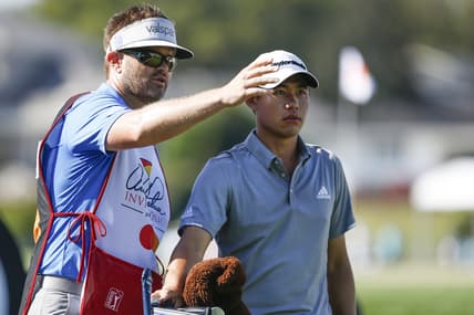 Mar 5, 2020; Orlando, Florida, USA; Colin Morikawa (right) listens to his caddie during the first round of the Arnold Palmer Invitational golf tournament at Bay Hill Club & Lodge. Mandatory Credit: Reinhold Matay-USA TODAY Sports
