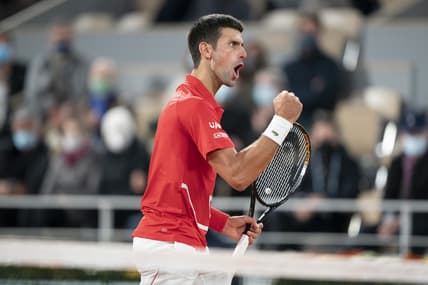 Oct 11, 2020;  Paris, France; Novak Djokovic (SRB) reacts during his match against Rafael Nadal (ESP) on day 15 at Stade Roland Garros. Mandatory Credit: Susan Mullane-USA TODAY Sports