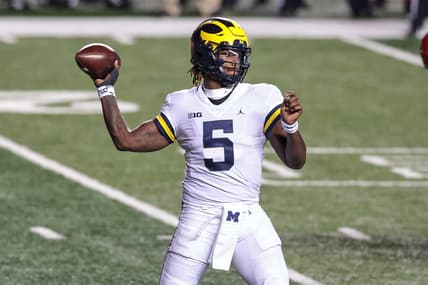 Nov 21, 2020; Piscataway, New Jersey, USA; Michigan Wolverines quarterback Joe Milton (5) throws the ball against the Rutgers Scarlet Knights during the first half at SHI Stadium. Mandatory Credit: Vincent Carchietta-USA TODAY Sports