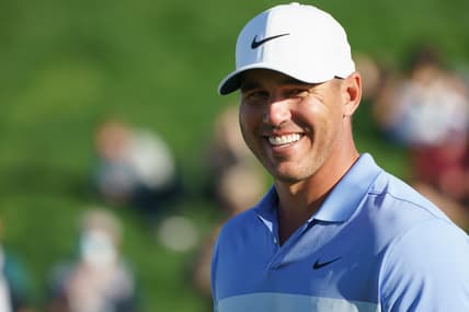 Feb 7, 2021; Scottsdale, Arizona, USA; Brooks Koepka celebrates after winning the final round of the Waste Management Phoenix Open golf tournament at TPC Scottsdale. Mandatory Credit: Allan Henry-USA TODAY Sports