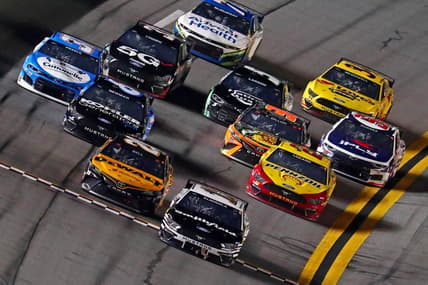 Feb 11, 2021; Daytona Beach, Florida, USA; NASCAR Cup Series driver Aric Almirola (10) wins the Bluegreen Vacations Duel 1 at Daytona International Speedway. Mandatory Credit: Mark J. Rebilas-USA TODAY Sports