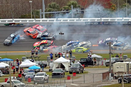 Feb 14, 2021; Daytona Beach, Florida, USA; NASCAR Cup Series drivers Ryan Newman (6), Erik Jones (43), Tyler Reddick (8), Martin Truex Jr. (19), Aric Almirola (10), Chris Buescher (17) and Alex Bowman (48) wreck during the Daytona 500 at Daytona International Speedway. Mandatory Credit: Mark J. Rebilas-USA TODAY Sports