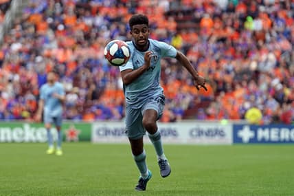 Apr 7, 2019; Cincinnati, OH, USA; Sporting Kansas City midfielder Gedion Zelalem (24) against FC Cincinnati at Nippert Stadium. Mandatory Credit: Aaron Doster-USA TODAY Sports