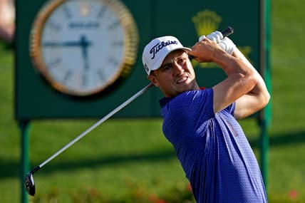 Mar 14, 2021; Ponte Vedra Beach, Florida, USA; Justin Thomas plays his shot from the 18th tee during the final round of The Players Championship golf tournament at TPC Sawgrass - Stadium Course. Mandatory Credit: Jasen Vinlove-USA TODAY Sports
