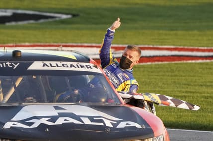 Mar 20, 2021; Hampton, GA, USA; NASCAR Xfinity Series driver Justin Allgaier (7) gives the crowd a thumbs up after winning at Atlanta Motor Speedway. Mandatory Credit: Marvin Gentry-USA TODAY Sports
