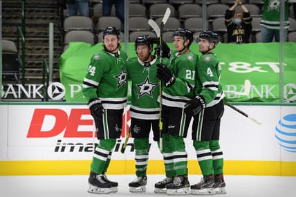 Mar 25, 2021; Dallas, Texas, USA; Dallas Stars left wing Roope Hintz (24) and center Joe Pavelski (16) and left wing Jason Robertson (21) and defenseman Miro Heiskanen (4) celebrates a goal scored by Pavelski against the Tampa Bay Lightning during the second period at the American Airlines Center. Mandatory Credit: Jerome Miron-USA TODAY Sports