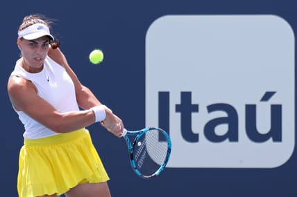 Mar 27, 2021; Miami, Florida, USA; Ana Konjuh of Croatia hits a backhand against Iga Swiatek of Poland (not pictured) in the third round in the Miami Open at Hard Rock Stadium. Mandatory Credit: Geoff Burke-USA TODAY Sports