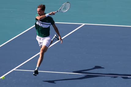 Mar 28, 2021; Miami, Florida, USA; Daniil Medvedev of Russia hits a forehand against Alexei Popyrin of Australia (not pictured) in the third round in the Miami Open at Hard Rock Stadium. Mandatory Credit: Geoff Burke-USA TODAY Sports