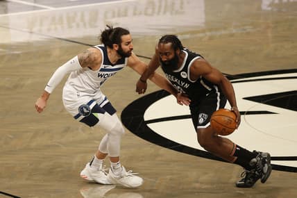 Mar 29, 2021; Brooklyn, New York, USA; Brooklyn Nets guard James Harden (13) dribbles the ball against Minnesota Timberwolves guard Ricky Rubio (9) during the first half at Barclays Center. Mandatory Credit: Andy Marlin-USA TODAY Sports