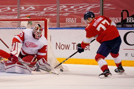 Mar 30, 2021; Sunrise, Florida, USA; Detroit Red Wings goaltender Thomas Greiss (29) blocks the shot of Florida Panthers center Frank Vatrano (77) during the second period at BB&T Center. Mandatory Credit: Jasen Vinlove-USA TODAY Sports