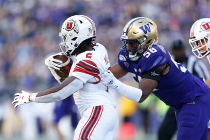 Nov 2, 2019; Seattle, WA, USA; Washington Huskies linebacker Zion Tupuola-Fetui (58) drags down Utah Utes running back Zack Moss (2) during the second quarter at Husky Stadium. Mandatory Credit: Jennifer Buchanan-USA TODAY Sports