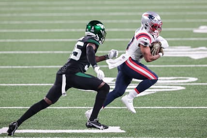 Nov 9, 2020; East Rutherford, New Jersey, USA; New England Patriots wide receiver Damiere Byrd (10) gains yards after the catch as New York Jets cornerback Pierre Desir (35) pursues during the second half at MetLife Stadium. Mandatory Credit: Vincent Carchietta-USA TODAY Sports