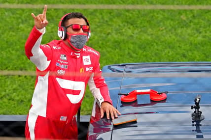 Feb 14, 2021; Daytona Beach, Florida, USA; NASCAR Cup Series driver Bubba Wallace (23) waves to fans during driver introductions before the Daytona 500 at Daytona International Speedway. Mandatory Credit: Mark J. Rebilas-USA TODAY Sports