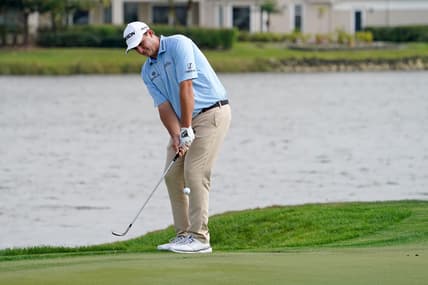 Mar 18, 2021; Palm Beach Gardens, Florida, USA; Sepp Straka chips onto the 18th green during the first round of The Honda Classic golf tournament at PGA National (Champion). Mandatory Credit: Jasen Vinlove-USA TODAY Sports