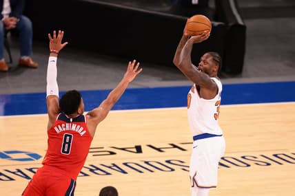 Mar 23, 2021; New York, New York, USA; New York Knicks forward Julius Randle (30) shoots the ball over Washington Wizards forward Rui Hachimura (8) during the second half at Madison Square Garden. Mandatory Credit: Vincent Carchietta-USA TODAY Sports