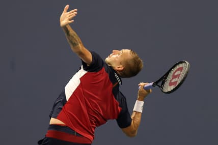 Mar 26, 2021; Miami, Florida, USA; Daniel Evans of Great Britain serves against Frances Tiafoe of the United States (not pictured) in the second round in the Miami Open at Hard Rock Stadium. Mandatory Credit: Geoff Burke-USA TODAY Sports
