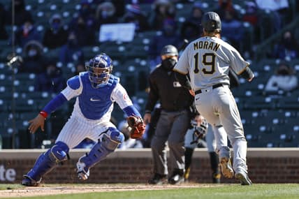 Apr 1, 2021; Chicago, Illinois, USA; Pittsburgh Pirates third baseman Colin Moran (19) scores against the Chicago Cubs in the fifth inning at Wrigley Field. Mandatory Credit: Kamil Krzaczynski-USA TODAY Sports