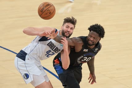 Apr 2, 2021; New York, New York, USA; New York Knicks forward Julius Randle (30) battles for a loose ball against Dallas Mavericks forward Maxi Kleber (42) during the first half at Madison Square Garden. Mandatory Credit: Vincent Carchietta-USA TODAY Sports