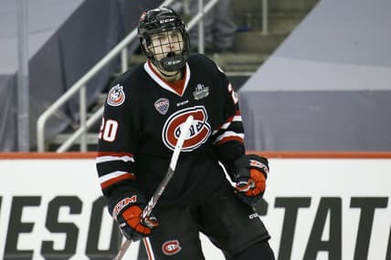 Apr 8, 2021; Pittsburgh, PA, USA; St. Cloud State Huskies forward Nolan Walker (20) celebrates his goal during the third period in the semifinals of the 2021 NCAA Frozen Four college hockey tournament against the Minnesota State Mavericks at PPG Paints Arena. Mandatory Credit: Charles LeClaire-USA TODAY Sports