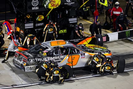 Apr 9, 2021; Martinsville, VA, USA; NASCAR Xfinity Series driver Noah Gragson (9) makes a pit stop at Martinsville Speedway. Mandatory Credit: Ryan Hunt-USA TODAY Sports