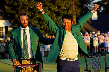 Apr 11, 2021; Augusta, Georgia, USA; Hideki Matsuyama celebrates with the green jacket presented by Dustin Johnson after winning The Masters golf tournament. Mandatory Credit: Michael Madrid-USA TODAY Sports