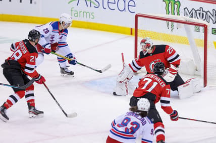 Apr 18, 2021; Newark, New Jersey, USA; New York Rangers left wing Chris Kreider (20) scores a goal past New Jersey Devils goaltender Mackenzie Blackwood (29) during the first period at Prudential Center. Mandatory Credit: Vincent Carchietta-USA TODAY Sports