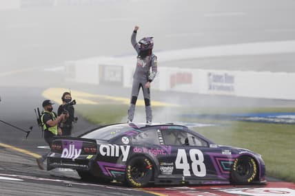 Apr 18, 2021; Richmond, Virginia, USA; NASCAR Cup Series driver Alex Bowman (48) celebrates after winning the Toyota Owners 400 at Richmond International Raceway. Mandatory Credit: Amber Searls-USA TODAY Sports