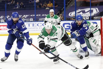 wApr 29, 2021; Tampa, Florida, USA;Tampa Bay Lightning left wing Alex Killorn (17) battles for the puck with center Alex Barre-Boulet (60) and Dallas Stars defenseman Esa Lindell (23) during the first period at Amalie Arena. Mandatory Credit: Kim Klement-USA TODAY Sports