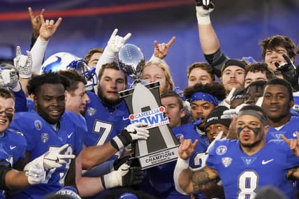 Dec 25, 2020; Montgomery, AL, USA; Buffalo Bulls hoist the trophy after winning the Camellia Bowl against Marshall Thundering Herd during the second half at Cramton Bowl Stadium. Mandatory Credit: Marvin Gentry-USA TODAY Sports