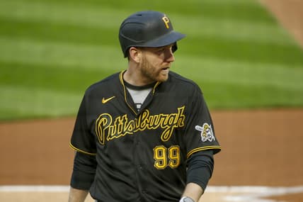 Apr 23, 2021; Minneapolis, Minnesota, USA; Pittsburgh Pirates first baseman Todd Frazier (99) returns to the dugout after striking out to the Minnesota Twins in the second inning at Target Field. Mandatory Credit: Bruce Kluckhohn-USA TODAY Sports