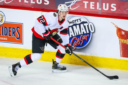 Apr 19, 2021; Calgary, Alberta, CAN; Ottawa Senators defenseman Thomas Chabot (72) skates with the puck against the Calgary Flames during the third period at Scotiabank Saddledome. Mandatory Credit: Sergei Belski-USA TODAY Sports