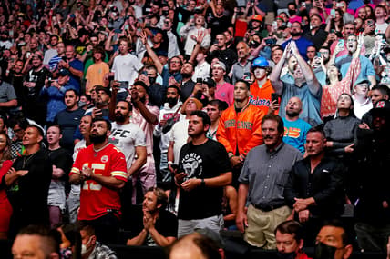 Apr 24, 2021; Jacksonville, Florida, USA; Fans cheer at the start of the fight between Kamaru Usman (Red Gloves) and Jorge Masvidal (Blue Gloves) during UFC 261 at VyStar Veterans Memorial Arena. Mandatory Credit: Jasen Vinlove-USA TODAY Sports