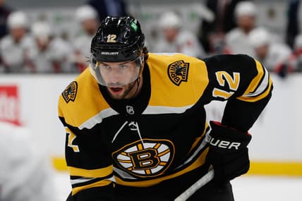 Apr 18, 2021; Boston, Massachusetts, USA; Boston Bruins right wing Craig Smith (12) during the first period against the Washington Capitals at TD Garden. Mandatory Credit: Winslow Townson-USA TODAY Sports