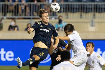 May 4, 2021; Chester, PA, USA; Philadelphia Union defender Jack Elliott (3) heads the ball against Atlanta United midfielder Santiago Sosa (5) during the second half at Subaru Park. Mandatory Credit: Bill Streicher-USA TODAY Sports