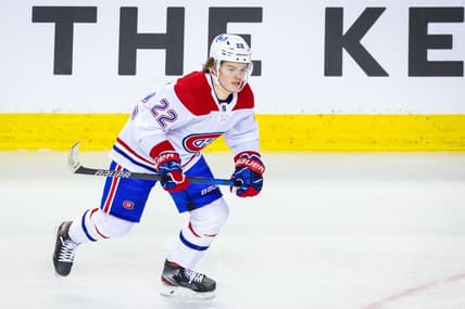 Apr 26, 2021; Calgary, Alberta, CAN; Montreal Canadiens right wing Cole Caufield (22) skates against the Calgary Flames during the third period at Scotiabank Saddledome. Mandatory Credit: Sergei Belski-USA TODAY Sports