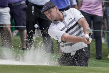 May 8, 2021; Charlotte, North Carolina, USA; Bryson DeChambeau pitches out of the bunker on 18 during the third round of the Wells Fargo Championship golf tournament. Mandatory Credit: Jim Dedmon-USA TODAY Sports