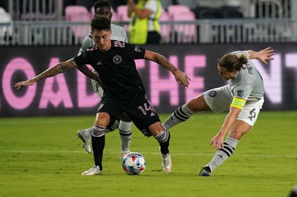 May 12, 2021; Fort Lauderdale, FL, Fort Lauderdale, FL, USA; Inter Miami CF midfielder Jay Chapman (14) and CF Montreal midfielder Samuel Piette (6) battle for the ball during the first half at DRV PNK Stadium. Mandatory Credit: Jasen Vinlove-USA TODAY Sports
