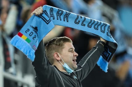 May 15, 2021; Saint Paul, MN, Saint Paul, MN, USA; A Minnesota United fan sings along to "Wonderwall" after Minnesota United defeated FC Dallas at Allianz Field. Mandatory Credit: David Berding-USA TODAY Sports