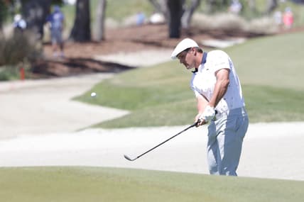 May 20, 2021; Kiawah Island, South Carolina, USA; Bryson DeChambeau chips onto the 1st green during the first round of the PGA Championship golf tournament. Mandatory Credit: Geoff Burke-USA TODAY Sports