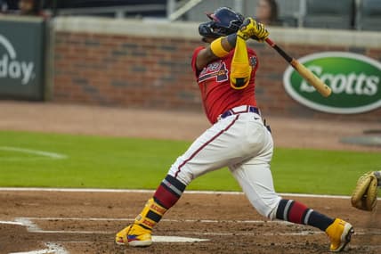 May 21, 2021; Cumberland, Georgia, USA; Atlanta Braves right fielder Ronald Acuna Jr. (13) hits a grand slam home run against the Pittsburgh Pirates during the second inning at Truist Park. Mandatory Credit: Dale Zanine-USA TODAY Sports