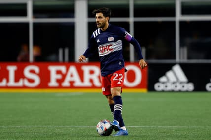 May 16, 2021; Foxborough, Massachusetts, USA; New England Revolution midfielder Carles Gil (22) during the second half against the Columbus Crew at Gillette Stadium. Mandatory Credit: Winslow Townson-USA TODAY Sports