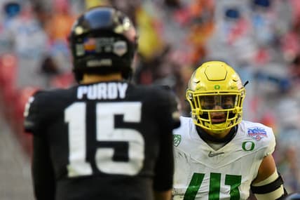 Jan 2, 2021; Glendale, AZ, USA; Oregon Ducks linebacker Isaac Slade-Matautia (41) looks down Iowa State Cyclones quarterback Brock Purdy (15) during the first half of the Fiesta Bowl at State Farm Stadium. Mandatory Credit: Joe Camporeale-USA TODAY Sports