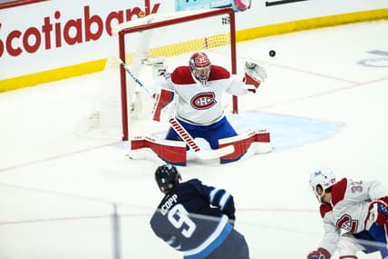 Jun 4, 2021; Winnipeg, Manitoba, CAN; Winnipeg Jets forward Andrew Copp (9) shoots wide of Montreal Canadiens goalie Carey Price (31) during the first period in game two of the second round of the 2021 Stanley Cup Playoffs at Bell MTS Place. Mandatory Credit: Terrence Lee-USA TODAY Sports