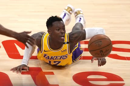 Jun 3, 2021; Los Angeles, California, USA; Los Angeles Lakers guard Dennis Schroder (17) reaches for the ball against the Phoenix Suns in the second half during game six in the first round of the 2021 NBA Playoffs. at Staples Center. Mandatory Credit: Kirby Lee-USA TODAY Sports